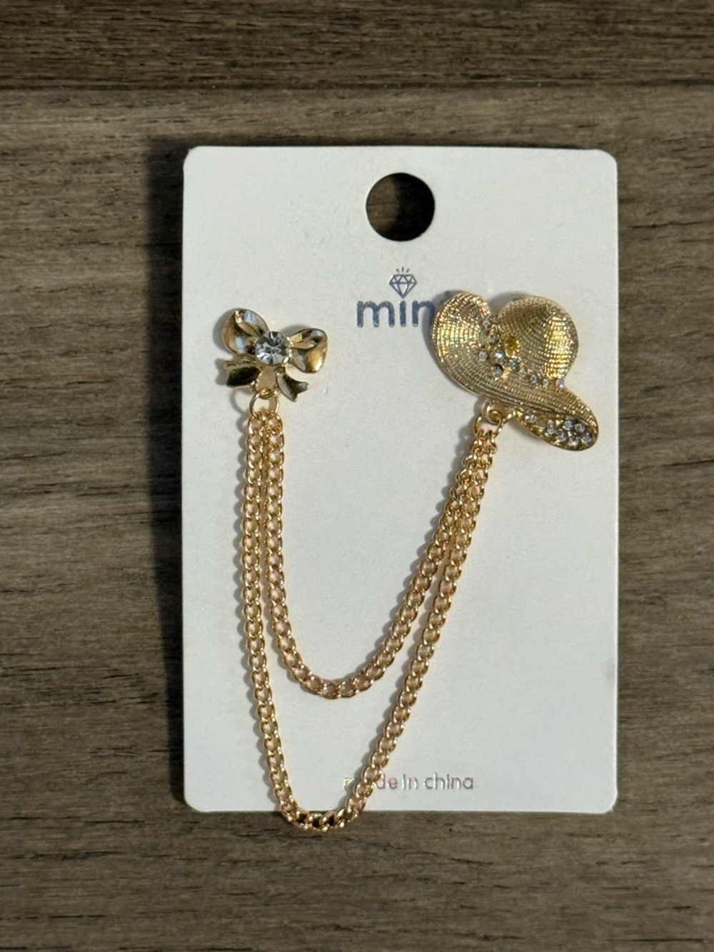 Gold Hat & Bow Chain Brooch with crystal accents